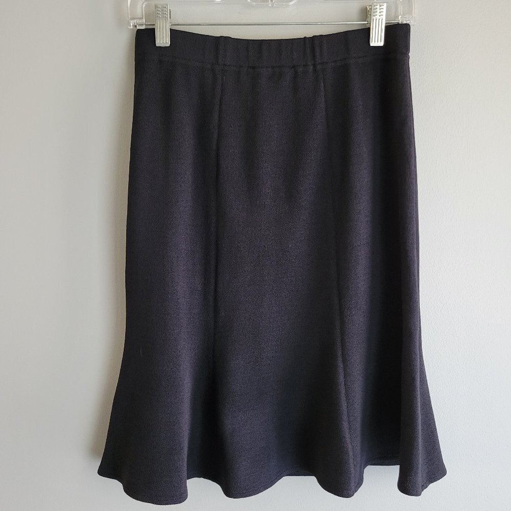 New with tags St. John black flare skirt originally purchased at Neiman Marcus.